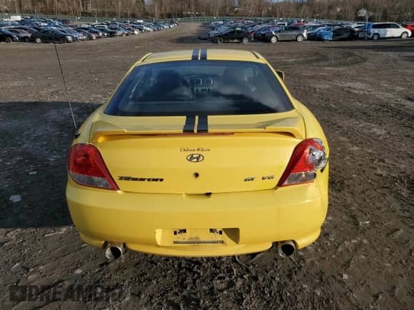 2006 Hyundai Tiburon GT с VIN KMHHN65F96U206869, выставлен на аукционе Copart как лот 45211625 с пробегом 117 415 миль миль и Списание • Salvage title. История ставок и продаж доступна на DreamBid. Изображение 6.