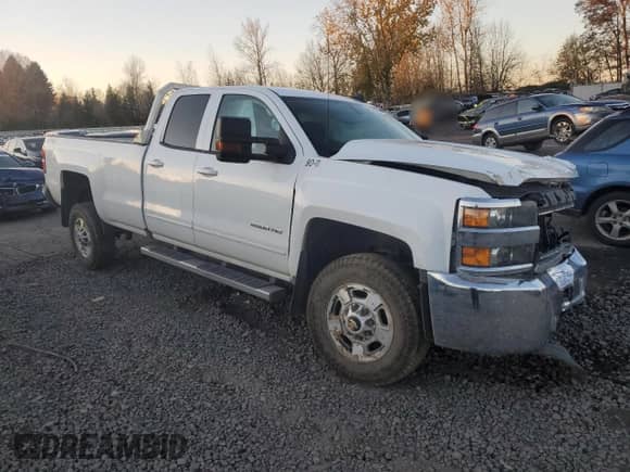 2018 Chevrolet Silverado 2500HD LT with VIN 1GC2KVEG0JZ119573, listed as a Copart auction lot 83095604 with 215,199 mi miles and Salvage title. Bid and sale history available at DreamBid. Image 4.