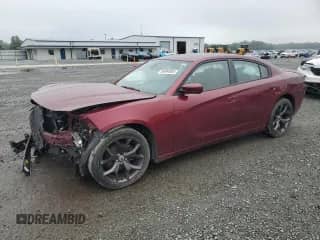 2019 Dodge Charger SXT с VIN 2C3CDXBG6KH588882, выставлен на аукционе Copart как лот 56994085 с пробегом 49 184 миль миль и Списание • Salvage title. История ставок и продаж доступна на DreamBid. Изображение 1.