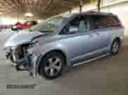 2012 Toyota Sienna LE with VIN 5TDKK3DC8CS195291, listed as a Copart auction lot 67239705 with 70,354 mi miles and Salvage title. Bid and sale history available at DreamBid. Image 1.
