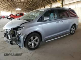 2012 Toyota Sienna LE with VIN 5TDKK3DC8CS195291, listed as a Copart auction lot 67239705 with 70,354 mi miles and Salvage title. Bid and sale history available at DreamBid. Image 1.