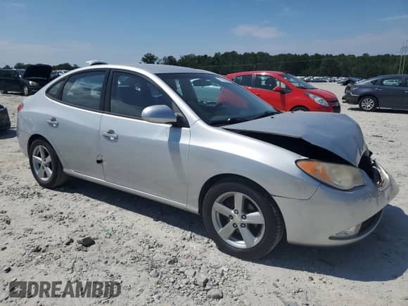 2010 Hyundai Elantra Blue z VIN KMHDU4AD3AU148051, wystawiony jako Copart lot #71119515 z przebiegiem 195 096 mil mil oraz Szkoda całkowita • Salvage title. Historia ofert i sprzedaży dostępna na DreamBid. Obrazek 4.