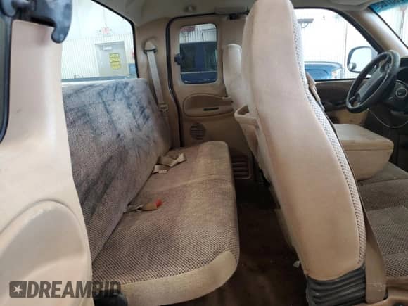 2001 Dodge 1500 z VIN 3B7HC13ZX1G202500, wystawiony jako Copart lot #69653765 z przebiegiem 155 949 mil mil oraz Szkoda całkowita • Salvage title. Historia ofert i sprzedaży dostępna na DreamBid. Obrazek 10.