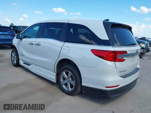 2020 Honda Odyssey EX-L with VIN 5FNRL6H77LB021095, listed as a IAAI auction lot 42581910 with 50,608 mi miles and . Bid and sale history available at DreamBid. Image 3.
