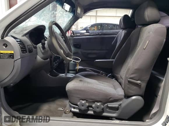 2005 Hyundai Accent GLS с VIN KMHCG35C55U346571, выставлен на аукционе Copart как лот 81104844 с пробегом Не указан миль и Списание • Salvage title. История ставок и продаж доступна на DreamBid. Изображение 7.