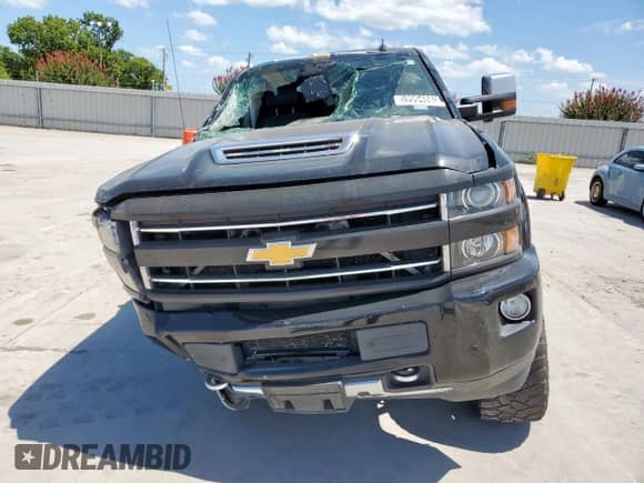2018 Chevrolet Silverado 2500HD High Country с VIN 1GC1KXEY9JF101557, выставлен на аукционе Copart как лот 65374345 с пробегом Не указан миль и Списание • Salvage title. История ставок и продаж доступна на DreamBid. Изображение 5.