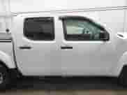 2019 Nissan Frontier SV z VIN 1N6AD0EV5KN773448, wystawiony jako IAAI lot #41611922 z przebiegiem 77 010 mil mil oraz . Historia ofert i sprzedaży dostępna na DreamBid. Obrazek 13.