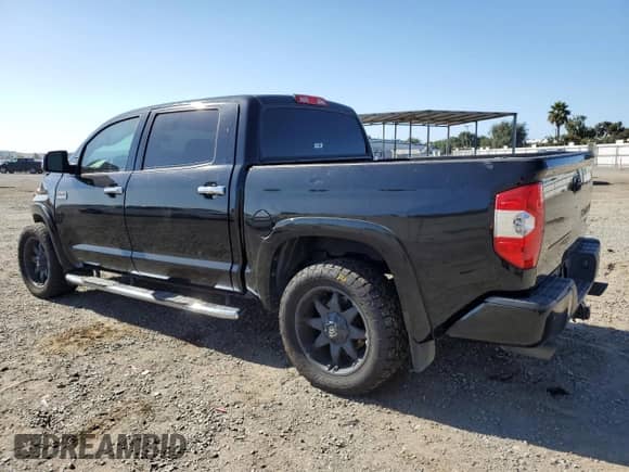 2015 Toyota Tundra 1794 Edition with VIN 5TFAW5F14FX485999, listed as a Copart auction lot 82696155 with 92,982 mi miles and Salvage title. Bid and sale history available at DreamBid. Image 2.