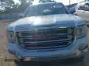 2018 GMC Sierra 1500 SLT z VIN 3GTP1NECXJG205818, wystawiony jako IAAI lot #42874974 z przebiegiem 144 799 mil mil oraz . Historia ofert i sprzedaży dostępna na DreamBid. Obrazek 12.