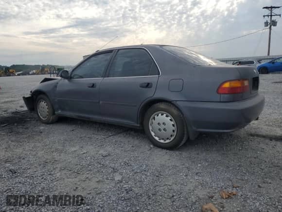 1994 Honda Civic with VIN 1HGEG8658RL009528, listed as a Copart auction lot 70803805 with 195,525 mi miles and Salvage title. Bid and sale history available at DreamBid. Image 2.