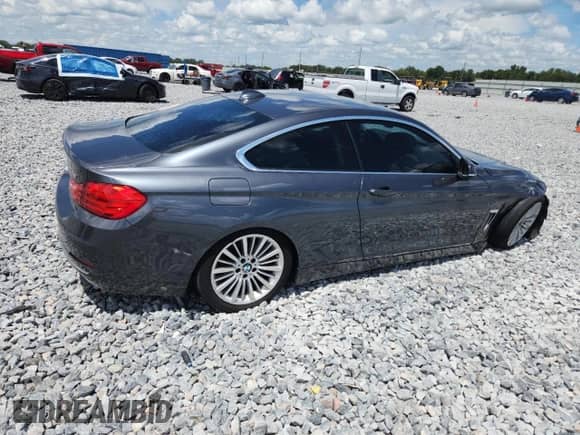 2015 BMW 4 Series 428i с VIN WBA3N3C51FK233032, выставлен на аукционе Copart как лот 67829035 с пробегом 132 427 миль миль и Списание • Salvage title. История ставок и продаж доступна на DreamBid. Изображение 3.