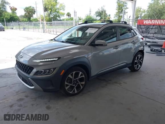 2022 Hyundai Kona Limited z VIN KM8K53A39NU770584, wystawiony jako IAAI lot #43089489 z przebiegiem 14 188 mil mil oraz . Historia ofert i sprzedaży dostępna na DreamBid. Obrazek 2.