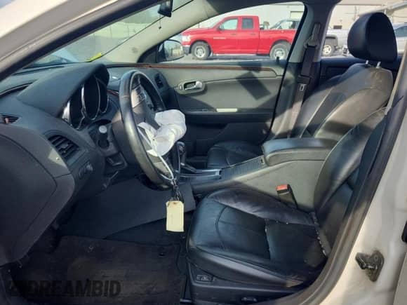 2012 Chevrolet Malibu LTZ z VIN 1G1ZG5E74CF284815, wystawiony jako Copart lot #81940285 z przebiegiem 119 577 mil mil oraz Szkoda całkowita • Salvage title. Historia ofert i sprzedaży dostępna na DreamBid. Obrazek 7.