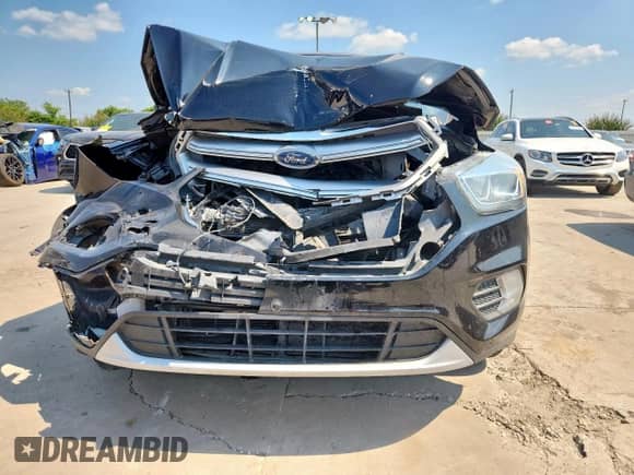 2017 Ford Escape Titanium with VIN 1FMCU0JD6HUB79020, listed as a Copart auction lot 67722175 with 102,901 mi miles and Salvage title. Bid and sale history available at DreamBid. Image 5.