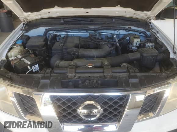 2016 Nissan Frontier S z VIN 1N6BD0CT3GN718770, wystawiony jako Copart lot #70010885 z przebiegiem 185 079 mil mil oraz Czysty tytuł • Clean title. Historia ofert i sprzedaży dostępna na DreamBid. Obrazek 11.