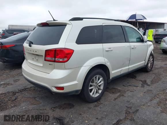 2014 Dodge Journey SXT with VIN 3C4PDCBB8ET121467, listed as a IAAI auction lot 43081106 with 260,518 mi miles and . Bid and sale history available at DreamBid. Image 4.