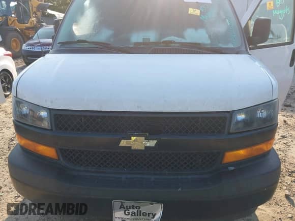 2020 Chevrolet Express Cargo with VIN 1GCWGBFP8L1123114, listed as a IAAI auction lot 43013804 with Not provided miles and . Bid and sale history available at DreamBid. Image 10.
