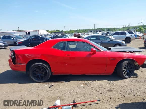 2014 Dodge Challenger R/T z VIN 2C3CDYBT0EH152777, wystawiony jako IAAI lot #42942496 z przebiegiem Nie podano mil oraz . Historia ofert i sprzedaży dostępna na DreamBid. Obrazek 13.