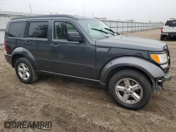 2011 Dodge Nitro SXT с VIN 1D4PT5GK0BW509907, выставлен на аукционе Copart как лот 42716715 с пробегом 88 884 миль миль и Списание • Salvage title. История ставок и продаж доступна на DreamBid. Изображение 4.
