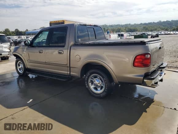 2003 Ford F-150 XLT z VIN 1FTRW07L43KB71901, wystawiony jako Copart lot #85125505 z przebiegiem 69 569 mil mil oraz Szkoda całkowita • Salvage title. Historia ofert i sprzedaży dostępna na DreamBid. Obrazek 2.