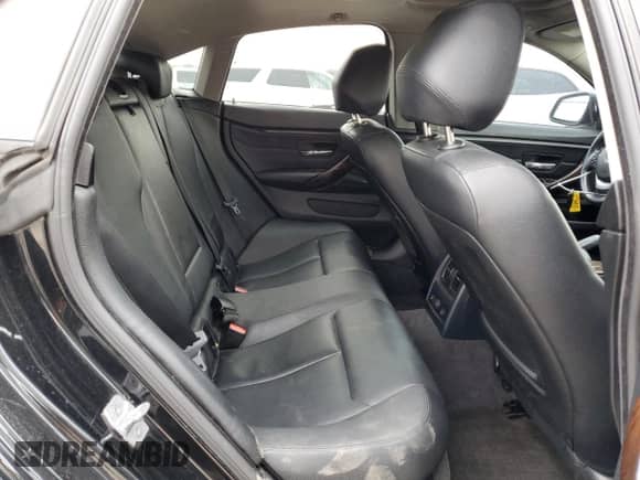 2015 BMW 4 Series 428i xDrive z VIN WBA4A7C52FD414720, wystawiony jako Copart lot #67213025 z przebiegiem 152 101 mil mil oraz Szkoda całkowita • Salvage title. Historia ofert i sprzedaży dostępna na DreamBid. Obrazek 10.