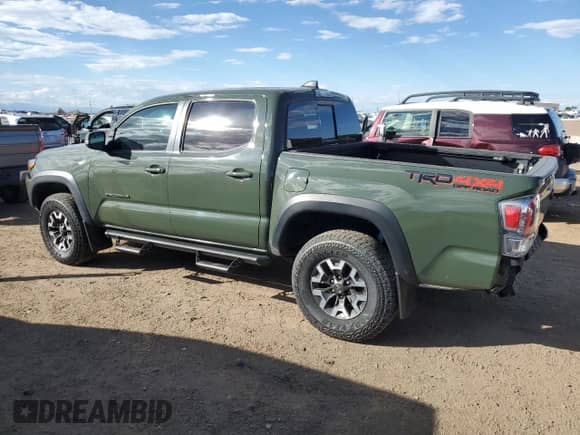 2022 Toyota Tacoma SR с VIN 3TMCZ5AN7NM519528, выставлен на аукционе Copart как лот 84897605 с пробегом 26 429 миль миль и Списание • Salvage title. История ставок и продаж доступна на DreamBid. Изображение 2.