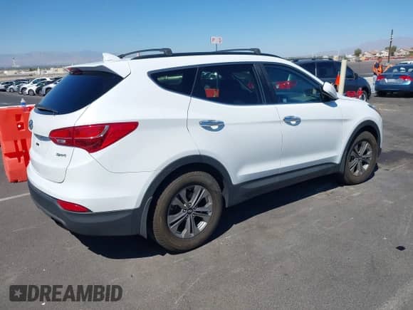 2016 Hyundai Santa Fe with VIN 5XYZU3LBXGG316388, listed as a IAAI auction lot 43215922 with 123,510 mi miles and . Bid and sale history available at DreamBid. Image 4.