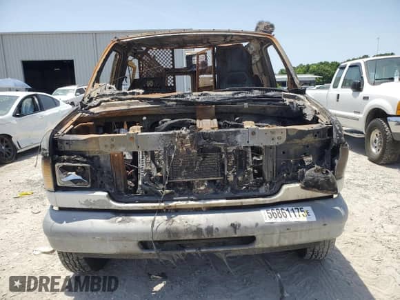 2000 Ford Econoline Cargo with VIN 1FTRE1428YHA45761, listed as a Copart auction lot 56861175 with Not provided miles and Salvage title. Bid and sale history available at DreamBid. Image 5.