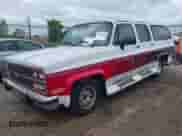 1991 Chevrolet Suburban z VIN 1GNER16KXMF133675, wystawiony jako IAAI lot #43036308 z przebiegiem 181 150 mil mil oraz . Historia ofert i sprzedaży dostępna na DreamBid. Obrazek 2.