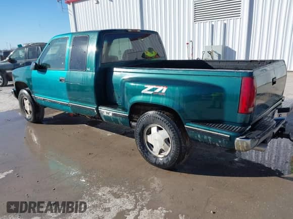 1997 Chevrolet Silverado 1500 with VIN 2GCEK19RXV1115899, listed as a IAAI auction lot 41671682 with 291,289 mi miles and . Bid and sale history available at DreamBid. Image 3.