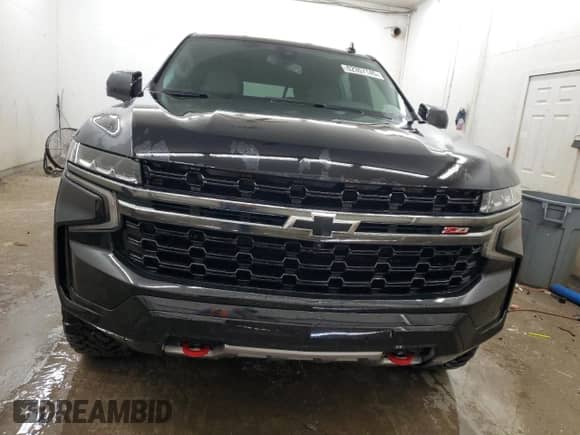 2022 Chevrolet Suburban Z71 with VIN 1GNSKDKD0NR104296, listed as a Copart auction lot 62357145 with 42,285 mi miles and Salvage title. Bid and sale history available at DreamBid. Image 5.