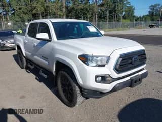 2023 Toyota Tacoma SR5 z VIN 3TMAZ5CN6PM216859, wystawiony jako IAAI lot #42716585 z przebiegiem 15 750 mil mil oraz . Historia ofert i sprzedaży dostępna na DreamBid. Obrazek 1.