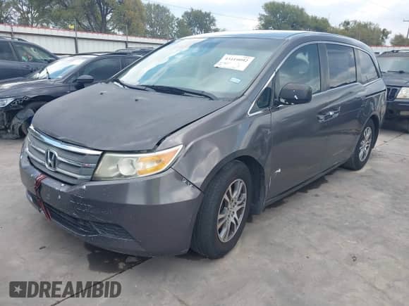 2012 Honda Odyssey EX z VIN 5FNRL5H40CB068484, wystawiony jako IAAI lot #43419092 z przebiegiem 251 003 mil mil oraz . Historia ofert i sprzedaży dostępna na DreamBid. Obrazek 2.