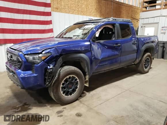 2024 Toyota Tacoma SR5 with VIN 3TMLB5JN1RM002946, listed as a Copart auction lot 68039525 with 21,113 mi miles and Salvage title. Bid and sale history available at DreamBid. Image 1.