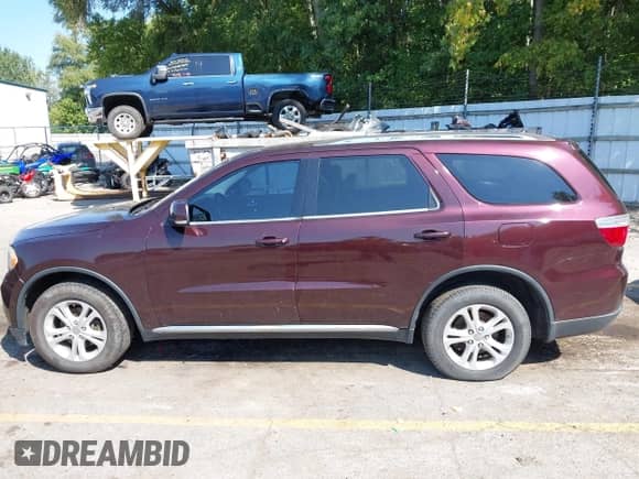 2012 Dodge Durango Crew with VIN 1C4RDJDG1CC153000, listed as a IAAI auction lot 43136614 with 186,788 mi miles and . Bid and sale history available at DreamBid. Image 14.