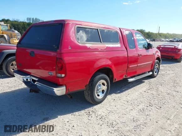 2003 Ford F-150 XL with VIN 1FTRX17W03NB76573, listed as a IAAI auction lot 43449766 with 92,078 mi miles and . Bid and sale history available at DreamBid. Image 4.