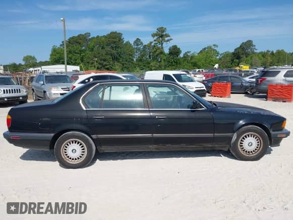 1991 BMW 7 Series with VIN WBAGC4312MDC29294, listed as a IAAI auction lot 42151104 with 357,161 mi miles and . Bid and sale history available at DreamBid. Image 13.