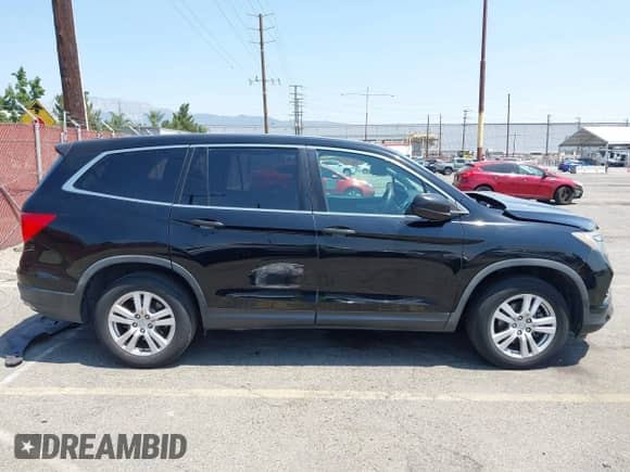 2018 Honda Pilot LX с VIN 5FNYF5H16JB010191, выставлен на аукционе IAAI как лот 42735527 с пробегом 155 906 миль миль и . История ставок и продаж доступна на DreamBid. Изображение 13.