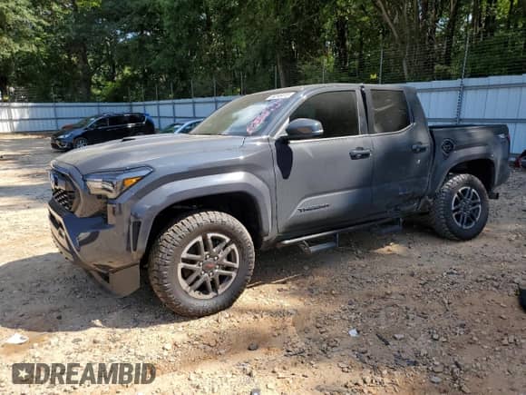 2025 Toyota Tacoma SR5 with VIN 3TMKB5FN4SM030413, listed as a Copart auction lot 69246415 with 2,871 mi miles and Salvage title. Bid and sale history available at DreamBid. Image 1.