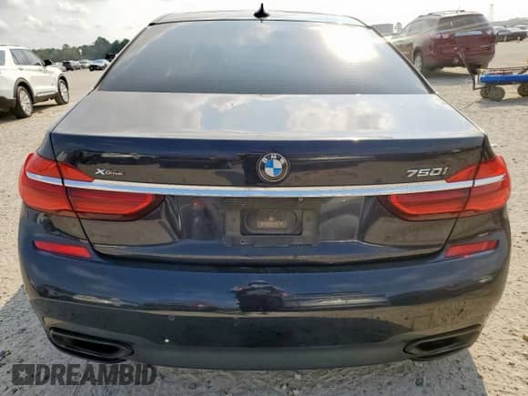 2016 BMW 7 Series 750i xDrive с VIN WBA7F2C57GG418330, выставлен на аукционе Copart как лот 80852555 с пробегом 129 555 миль миль и Списание • Salvage title. История ставок и продаж доступна на DreamBid. Изображение 6.