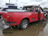 2000 Ford F-150 XL z VIN 2FTRX07L6YCA33124, wystawiony jako Copart lot #58989405 z przebiegiem Nie podano mil oraz Szkoda całkowita • Salvage title. Historia ofert i sprzedaży dostępna na DreamBid. Obrazek 3.