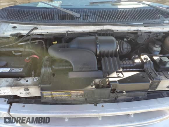 1999 Ford Econoline Cargo z VIN 1FTRE1420XHC02150, wystawiony jako Copart lot #46551175 z przebiegiem 439 114 mil mil oraz Szkoda całkowita • Salvage title. Historia ofert i sprzedaży dostępna na DreamBid. Obrazek 12.