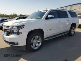 2016 Chevrolet Suburban LTZ with VIN 1GNSCJKC7GR415956, listed as a Copart auction lot 71857055 with 213,861 mi miles and Salvage title. Bid and sale history available at DreamBid. Image 1.