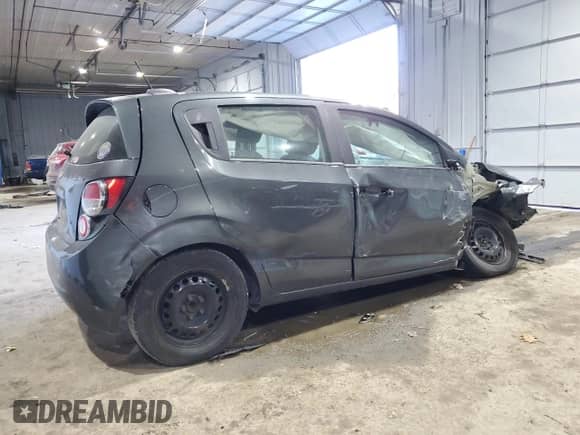 2016 Chevrolet Sonic LS с VIN 1G1JB6SH7G4114965, выставлен на аукционе Copart как лот 88698585 с пробегом Не указан миль и Списание • Salvage title. История ставок и продаж доступна на DreamBid. Изображение 3.