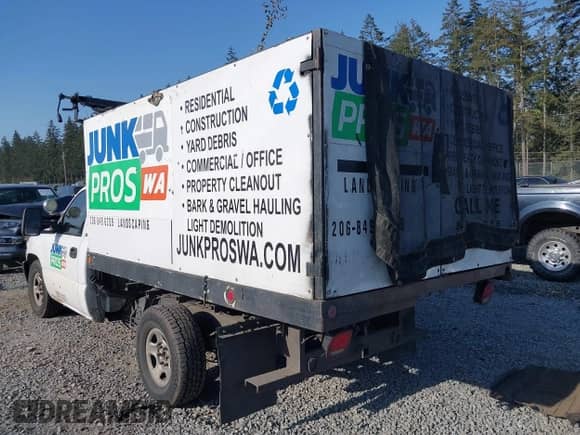 2001 GMC Sierra 1500 SLE with VIN 1GTEC14V21E285975, listed as a IAAI auction lot 42095410 with 101,285 mi miles and . Bid and sale history available at DreamBid. Image 3.