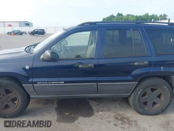 2004 Jeep Grand Cherokee Laredo with VIN 1J4GW48N34C357627, listed as a IAAI auction lot 42672019 with 249,510 mi miles and . Bid and sale history available at DreamBid. Image 14.