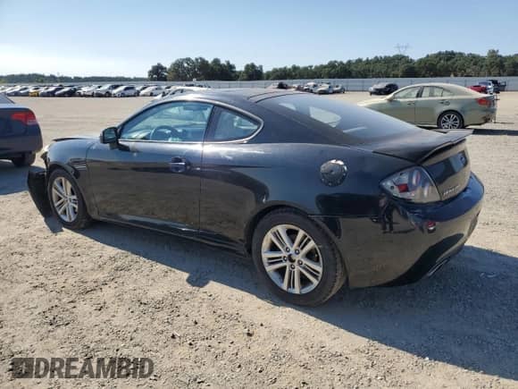 2008 Hyundai Tiburon GS с VIN KMHHM66DX8U265397, выставлен на аукционе Copart как лот 65239165 с пробегом 163 072 миль миль и Списание • Salvage title. История ставок и продаж доступна на DreamBid. Изображение 2.