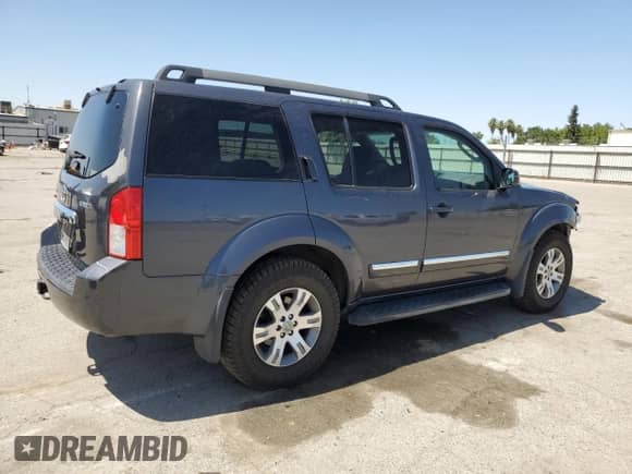 2011 Nissan Pathfinder LE z VIN 5N1AR1NN6BC633653, wystawiony jako Copart lot #62021675 z przebiegiem 93 214 mil mil oraz Szkoda całkowita • Salvage title. Historia ofert i sprzedaży dostępna na DreamBid. Obrazek 3.