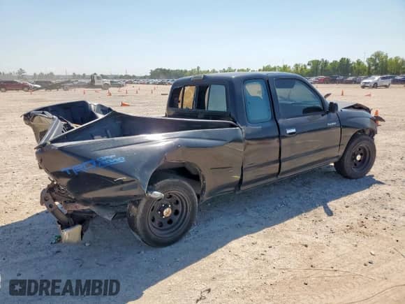 1997 Toyota Tacoma z VIN 4TAVL52N6VZ319081, wystawiony jako Copart lot #71695955 z przebiegiem 262 304 mil mil oraz Szkoda całkowita • Salvage title. Historia ofert i sprzedaży dostępna na DreamBid. Obrazek 3.