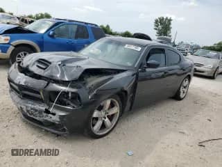 2007 Dodge Charger SRT-8 с VIN 2B3KA73W07H809178, выставлен на аукционе Copart как лот 60517385 с пробегом Не указан миль и Списание • Salvage title. История ставок и продаж доступна на DreamBid. Изображение 1.